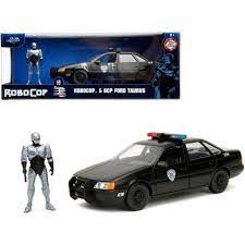 Auto Ford Taurus 1986 OCP con Robocop 1:24 Jada Toys JT-33743