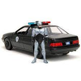 Auto Ford Taurus 1986 OCP con Robocop 1:24 Jada Toys JT-33743